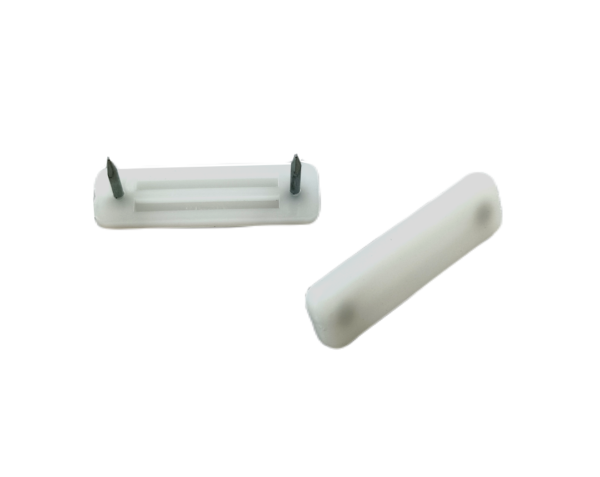 Plastový kluzák s dvěma hřeby, 40x12mm-bílý